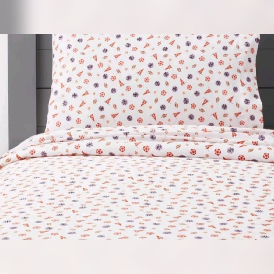 White kids sheet set with a sports ball print