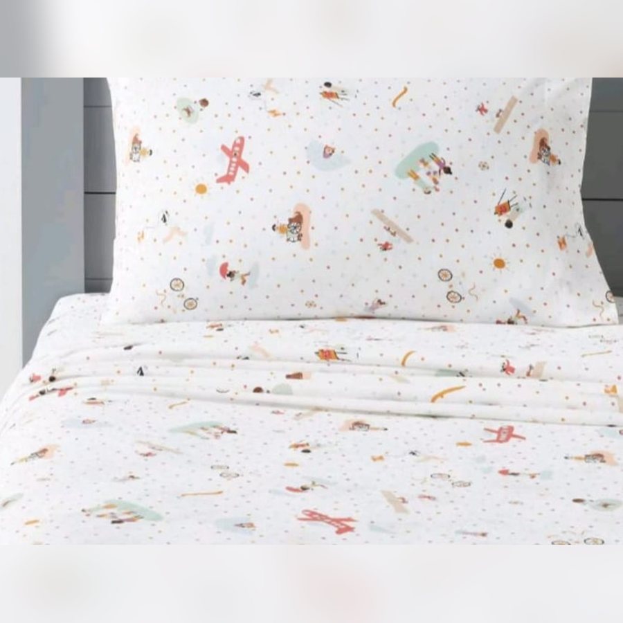 White kids sheet set with a travel print