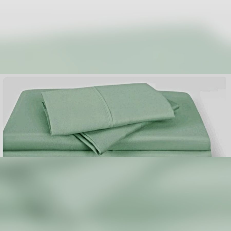Folded sage green sheet set
